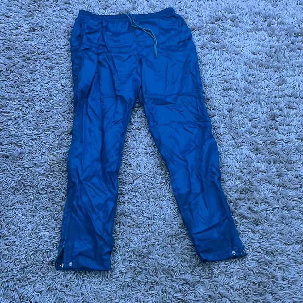 Adidas teal nylon pants, size medium